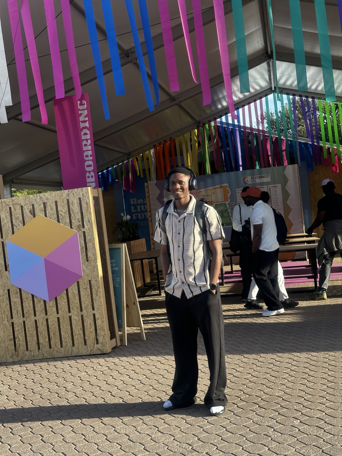 Samuel Dahunsi at the Devconnect Argentina Ethereum World's Fair venue in Buenos Aires