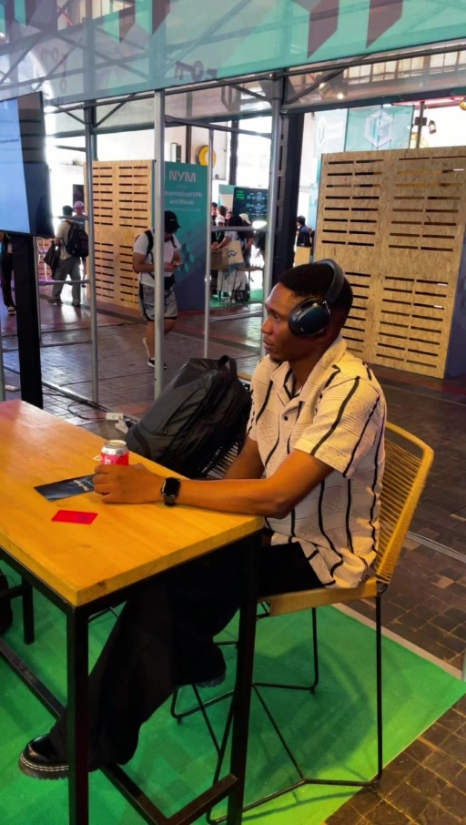 Samuel Dahunsi participating in an interactive installation at Devconnect Argentina